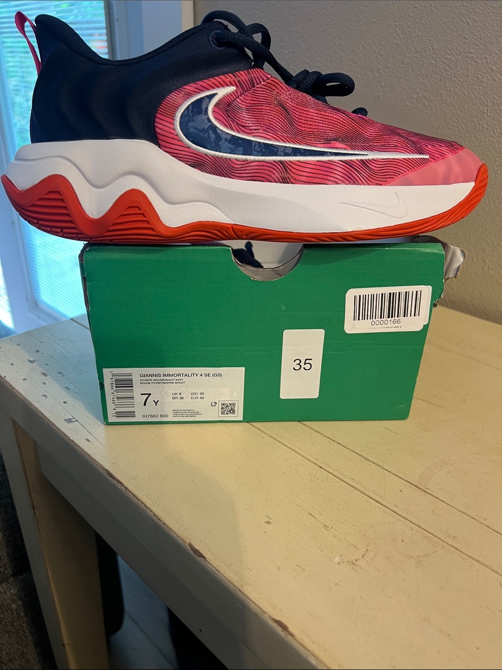 Nike Kids' Giannis Immortality 4 SE Pink and navy Basketball Sneakers